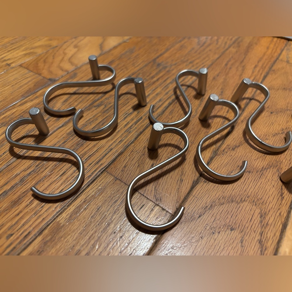 Shower curtain hooks. Brushed silver color. 12 in total.